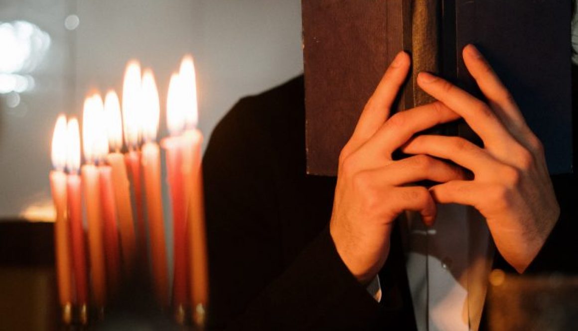 person-holding-a-book-4038291