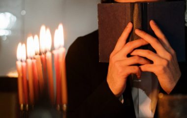 person-holding-a-book-4038291